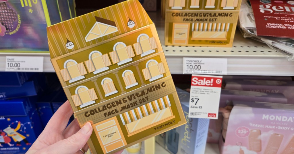 woman holding TONYMOLY Vitamin C & Collagen Sheet Mask Gift Set in target store