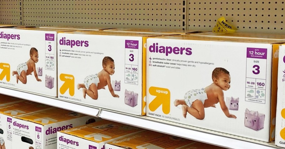 boxes of size 3 up&up diapers on store shelf