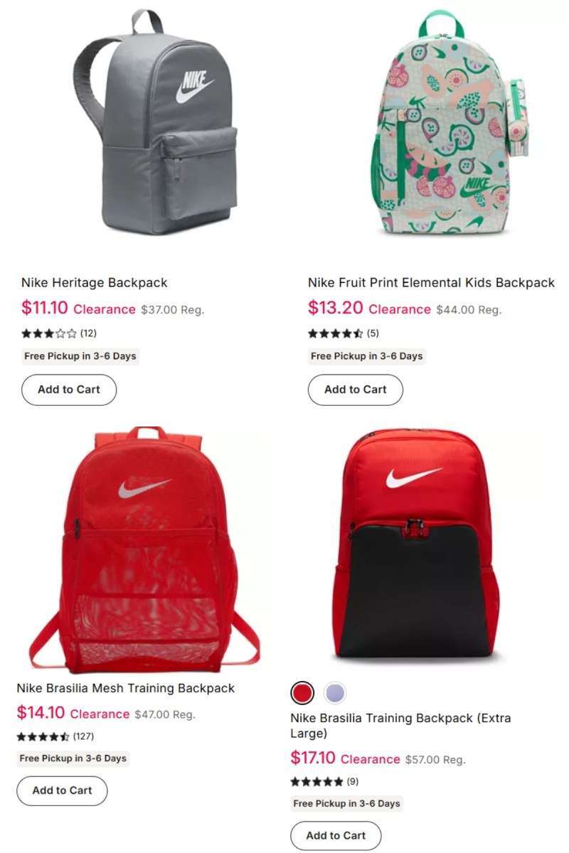 four Nike backpacks shown on a website shopping page