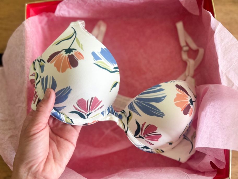 Hand touching Vanity Fair Ego Boost padded bra