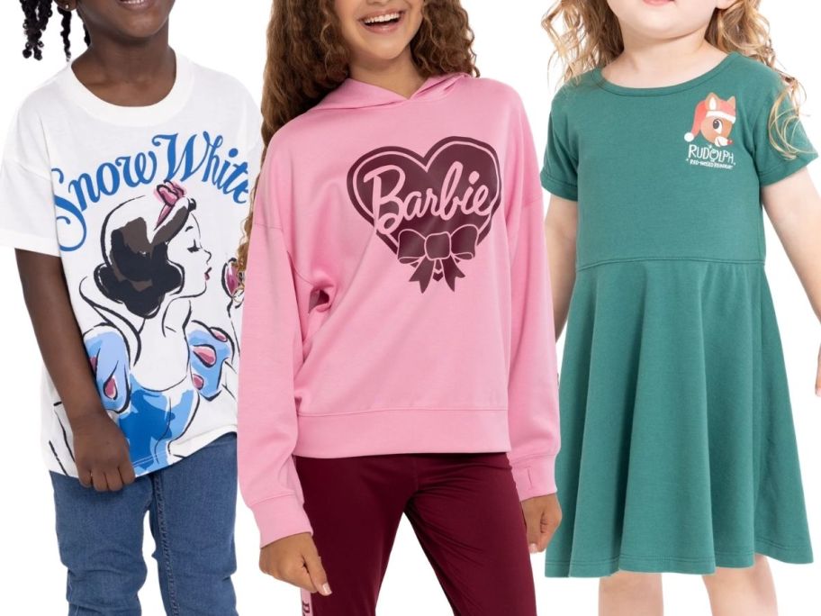 3 girls wearing t-shirts and dresses with characters on them