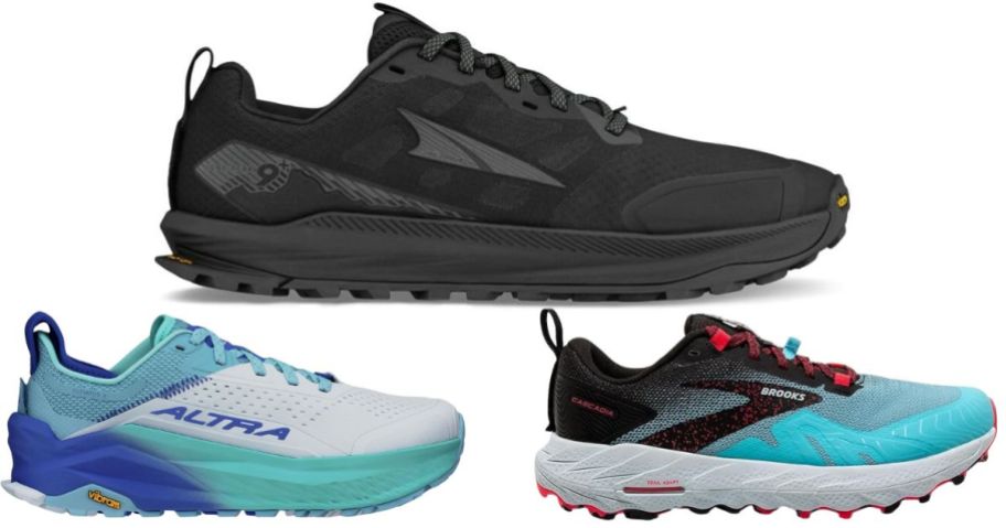 A black running shoe on top of white and blue running shoes