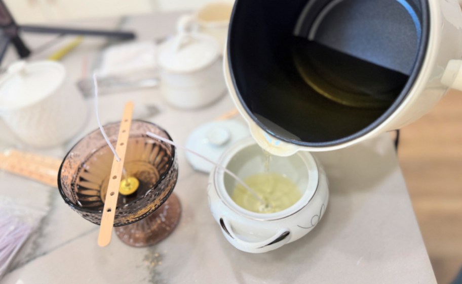 adding melted wax to a container