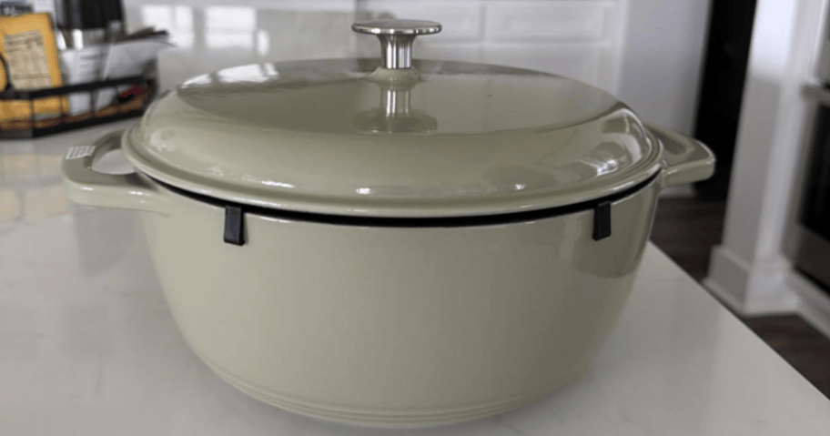 olive dutch oven on kitchen counter