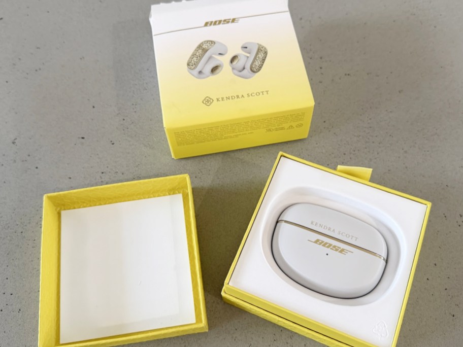 bose earbuds in box on table