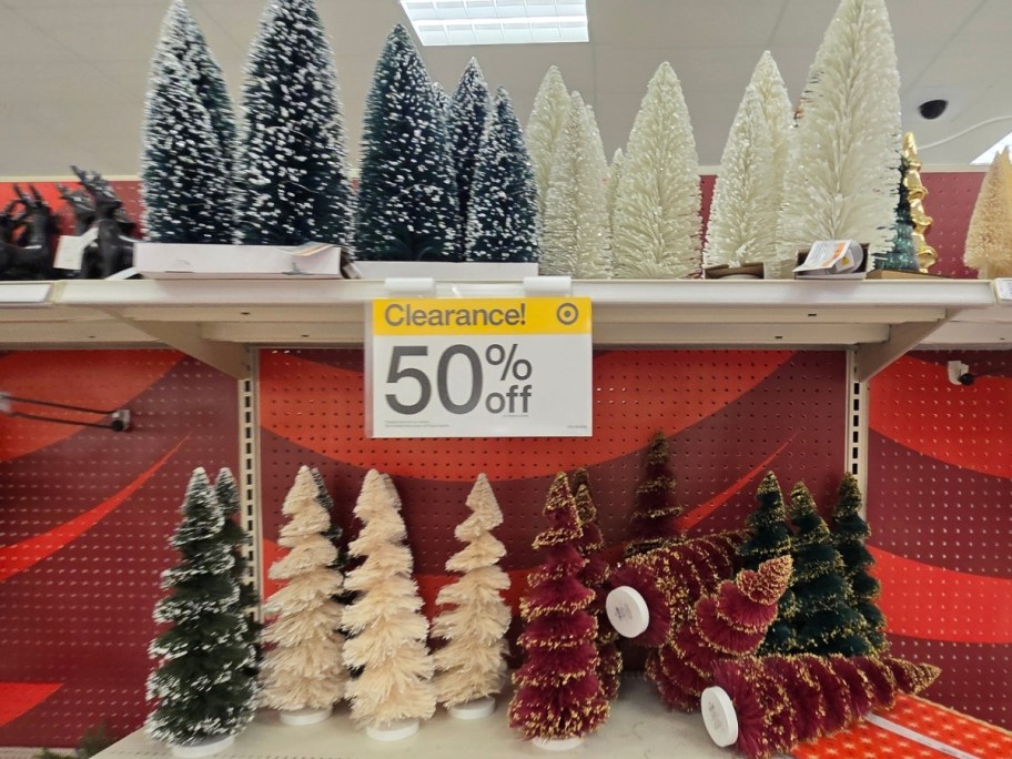 bottle brush trees on a store shelf