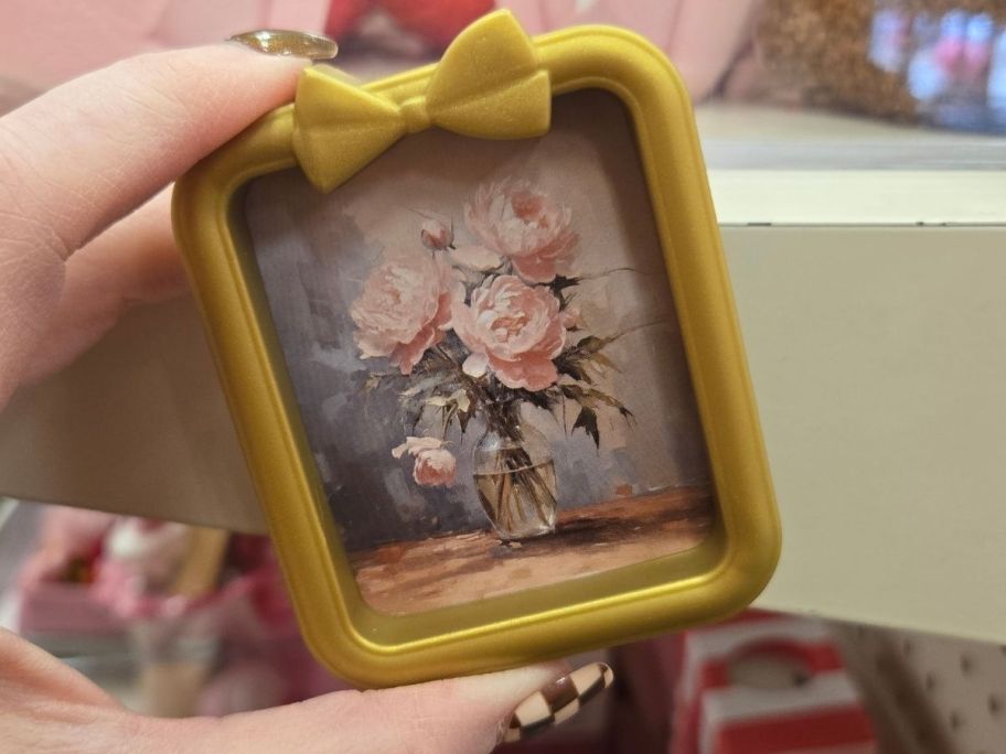 Gallery Magnet in hand in store