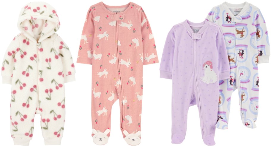 Four baby onesies are displayed: a white hooded one with cherries, a pink one with rabbits, a purple one with polar bears, and a blue one with penguins.