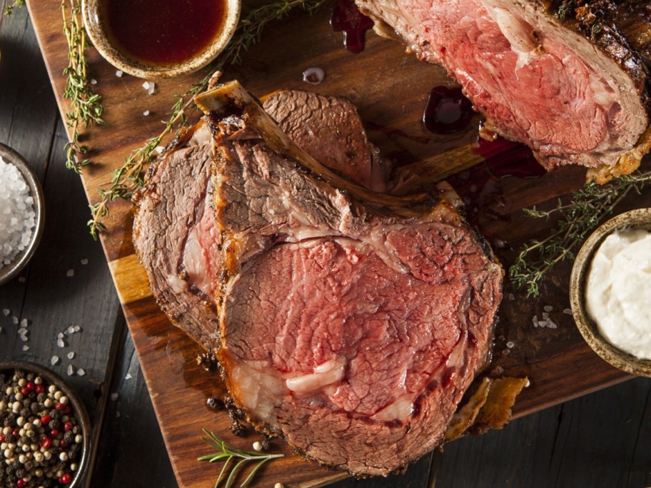 prime rib on wooden cutting board