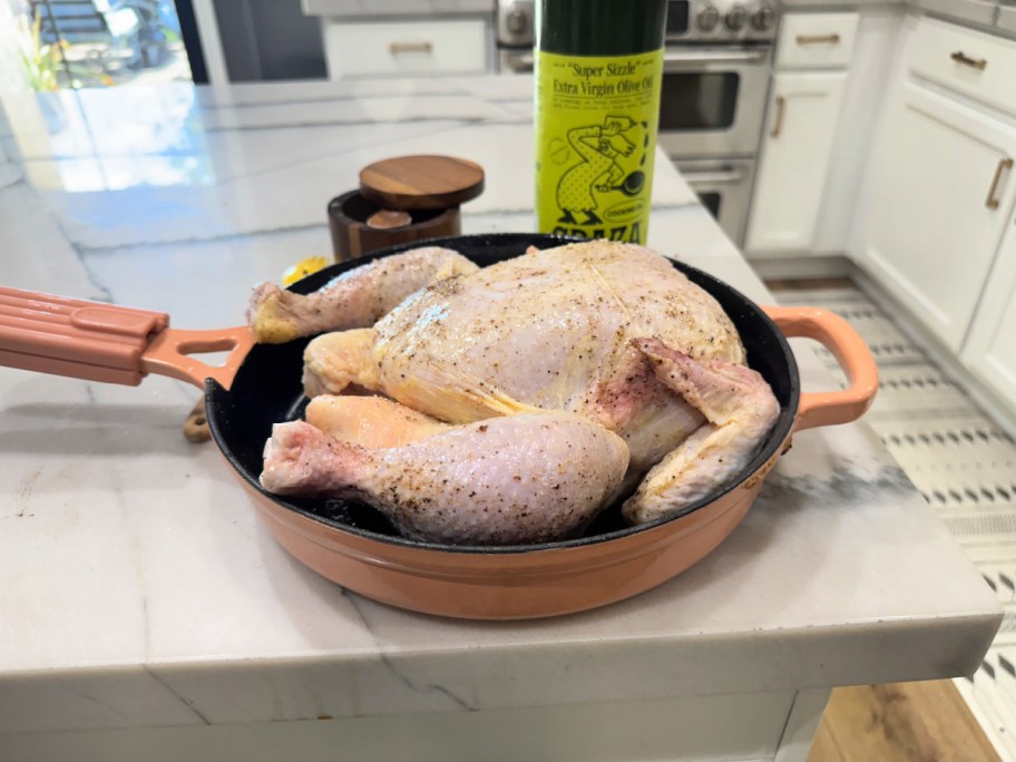 chicken with salt pepper and olive oil ready for the oven 