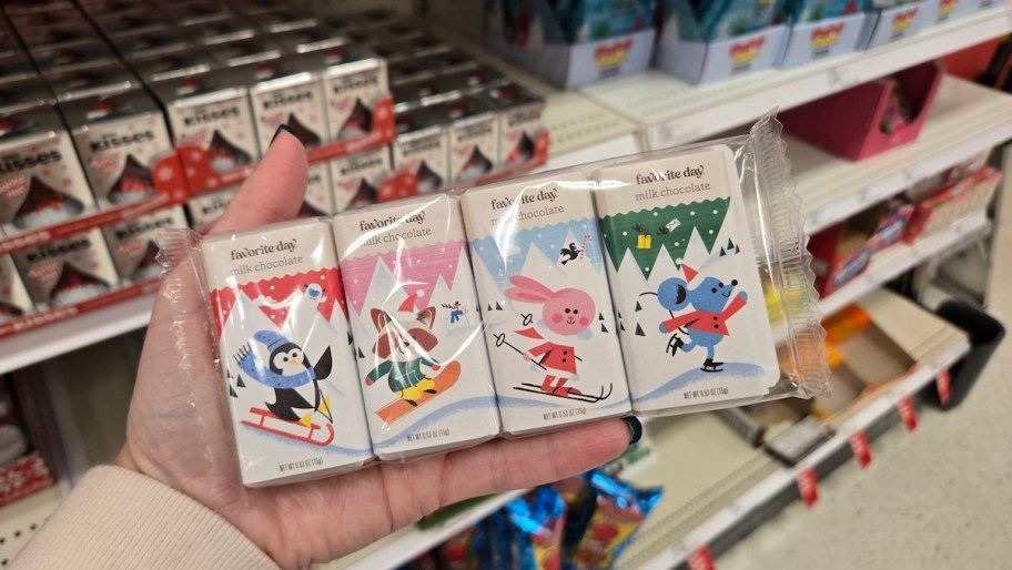 hand holding pack of christmas chocolate bars