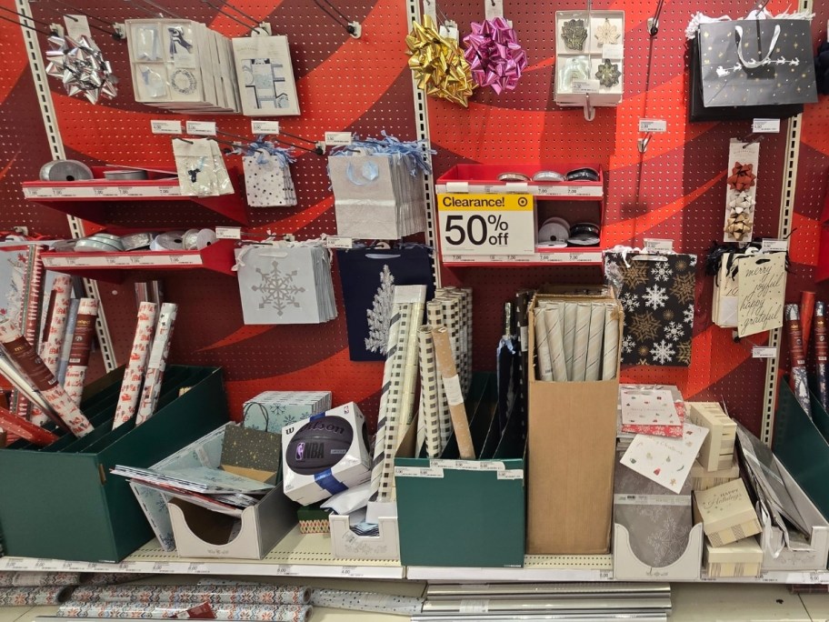 holiday gift bags, bows,, and tissue paper