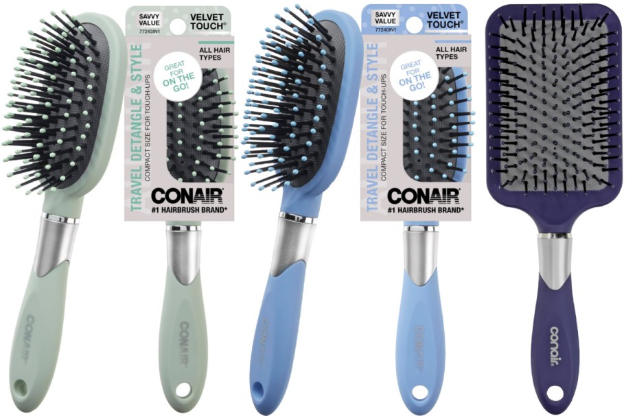 Three Conair hairbrushes against a white background: a mint green travel brush and a light blue travel brush, both shown loose and in their packaging, alongside a dark purple paddle brush.