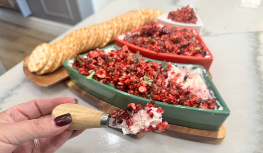 cranberry cream cheese spread on a knife
