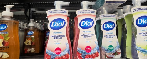 bottles of dial hand soap on a store shelf
