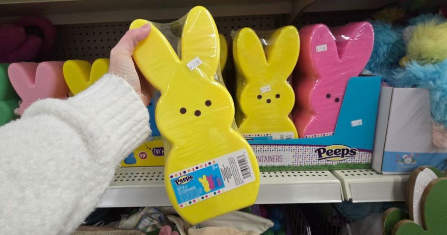 hand holding Peeps Bunny-Shaped Nesting Plastic Egg Container in store