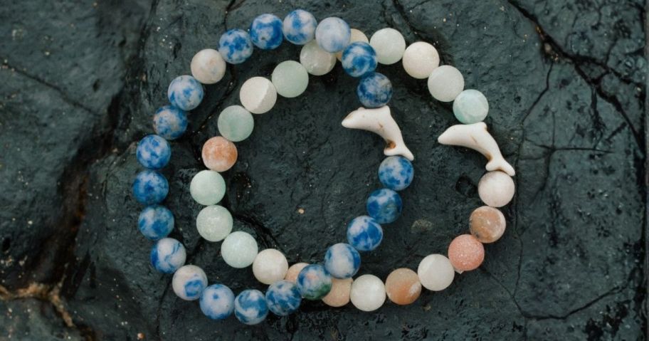 two fahlo bracelets on rock