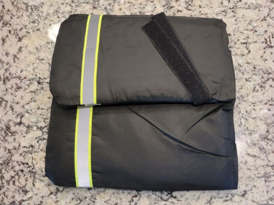 two outdoor faucet covers on table