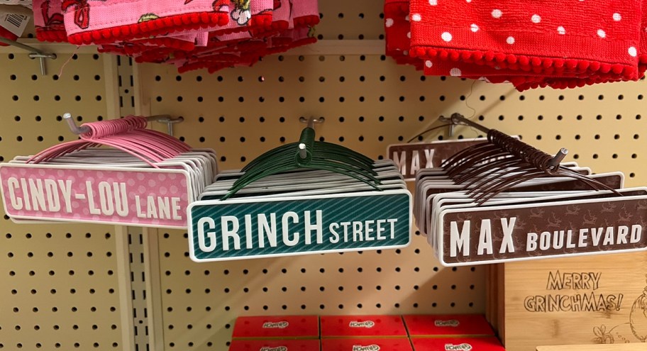 pink, green and brown metal signs 