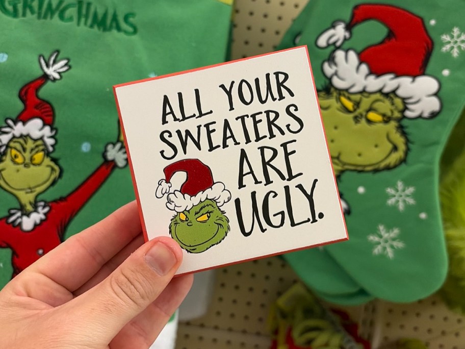 grinch sweaters sign 