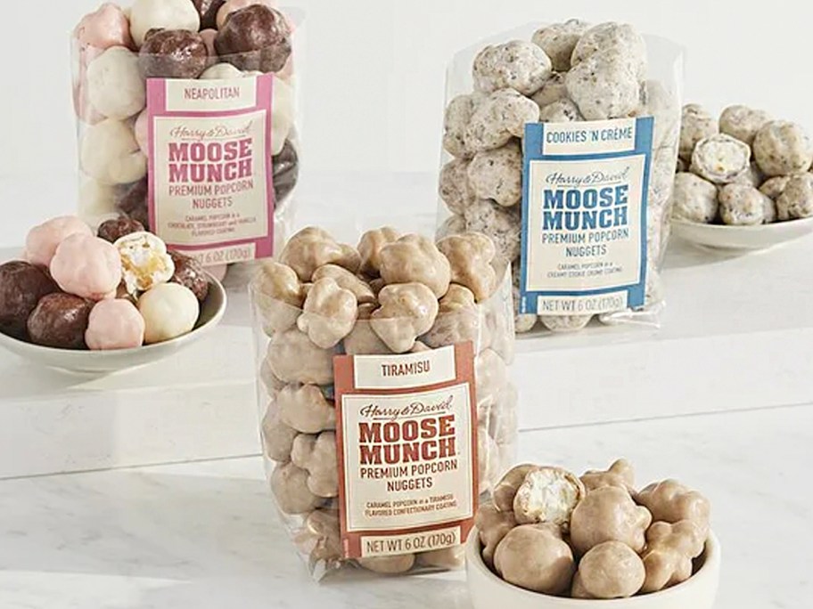 three bags of moose munch popcorn