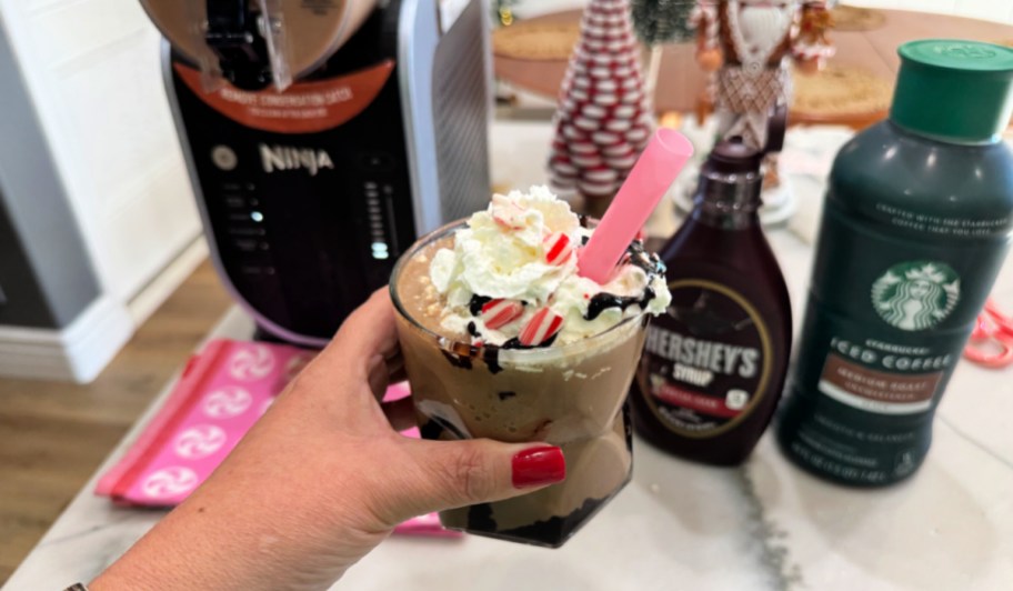holding a frozen peppermint mocha starbucks copycat drink