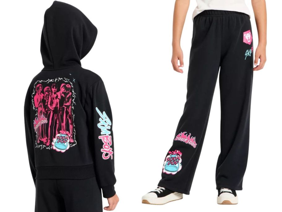 two kids wearing a kpop demon hunters sweatshirt and sweatpants