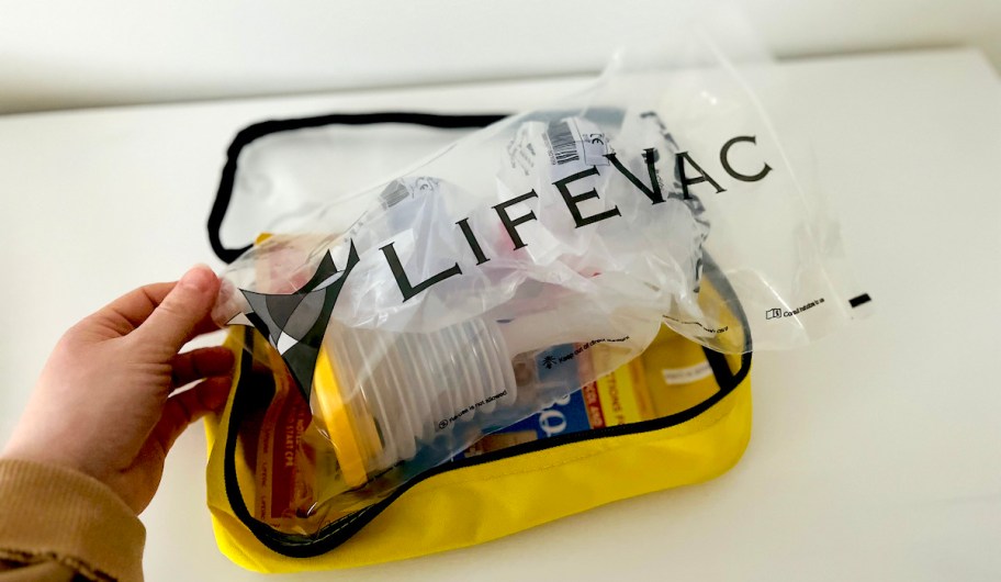 hand holding lifevac kit 