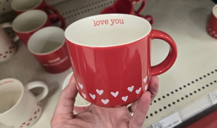 red mug with white hearts