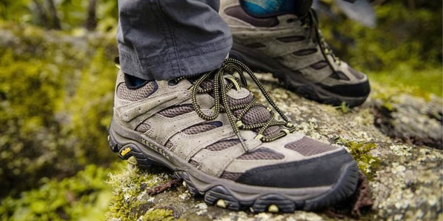 tan and black merrell shoes outdoors 