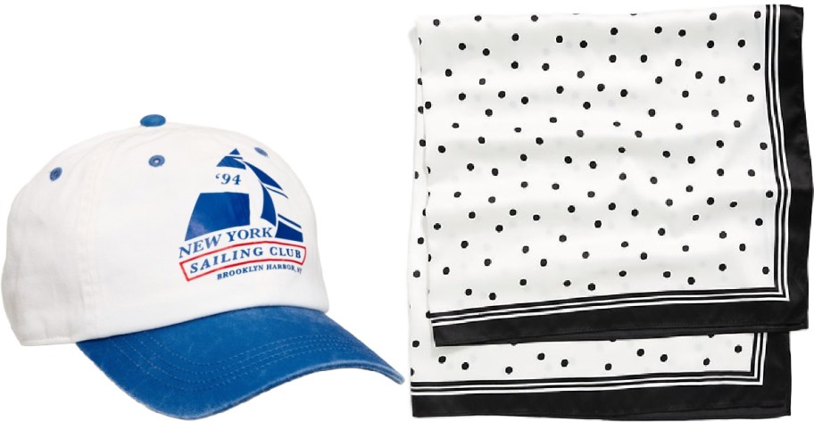 A white baseball cap with a blue sailboat graphic and "New York Sailing Club" text. Next to it is a folded white scarf with black polka dots and a border.