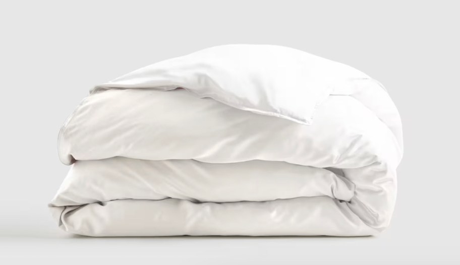 white comforter with duvet folded