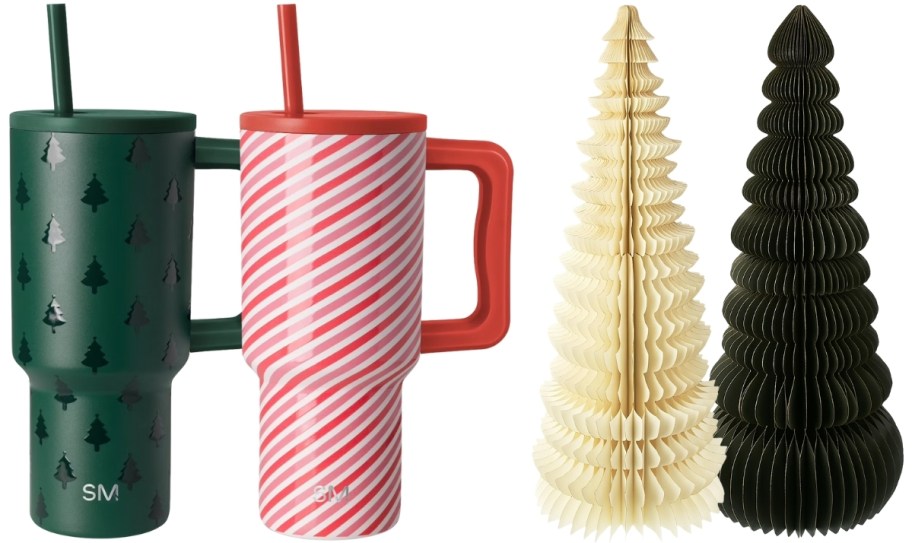 two staw tumblers and two paper christmas trees