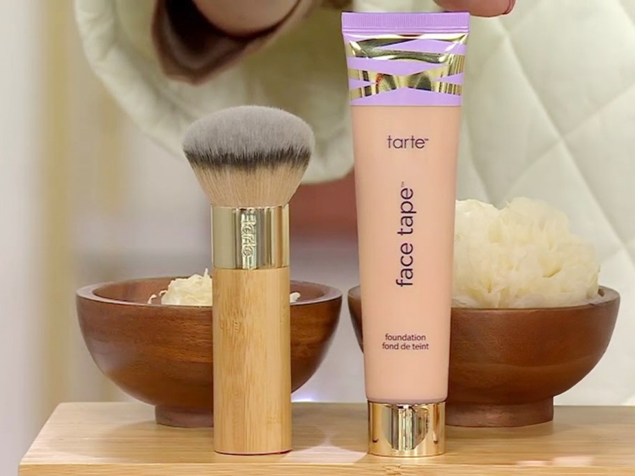 tarte shape tape and brush on table