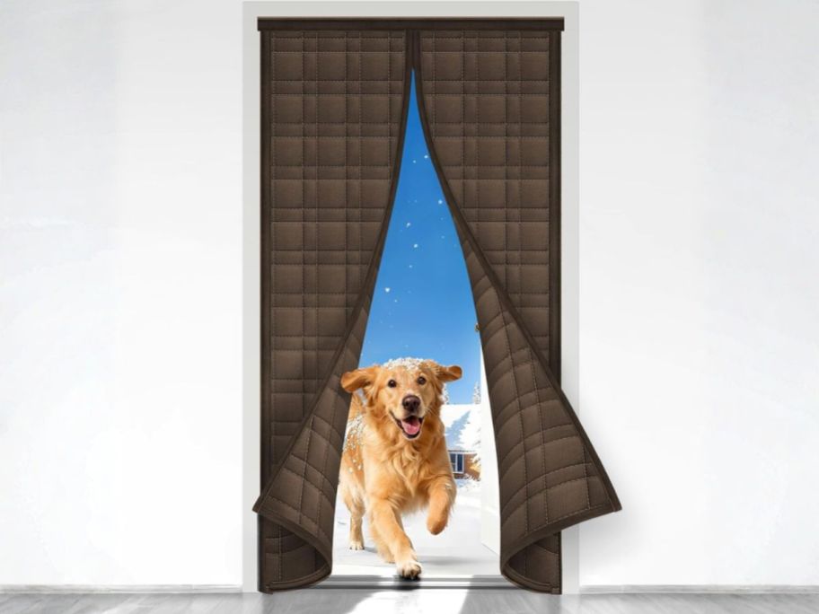 dog running through thermal door curtain