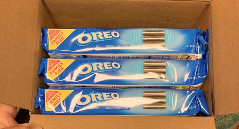 three oreo cookies inside of an amazon box