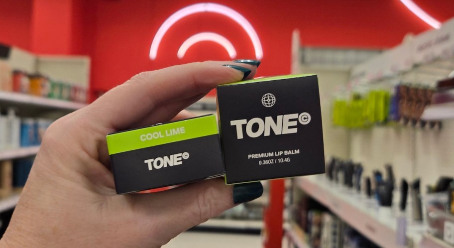 hand holding tone lip balm