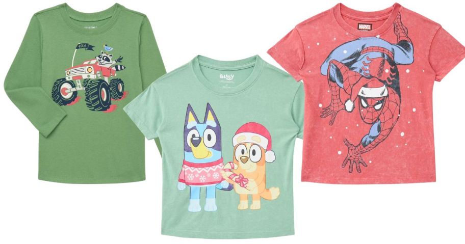 a green shirt with truck on it, a bluey shirt, and a spiderman shirt