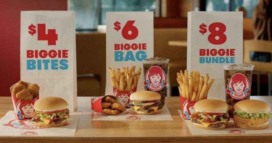 three wendys biggie value meals on table in store