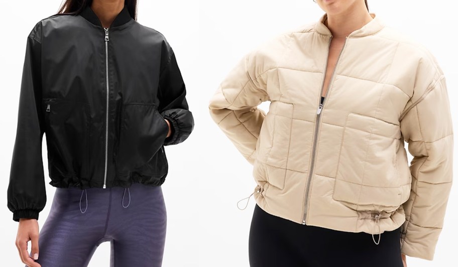 two women in black and tan jackets