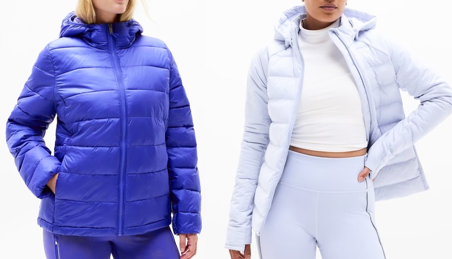 two women in dark purple and light purple jackets