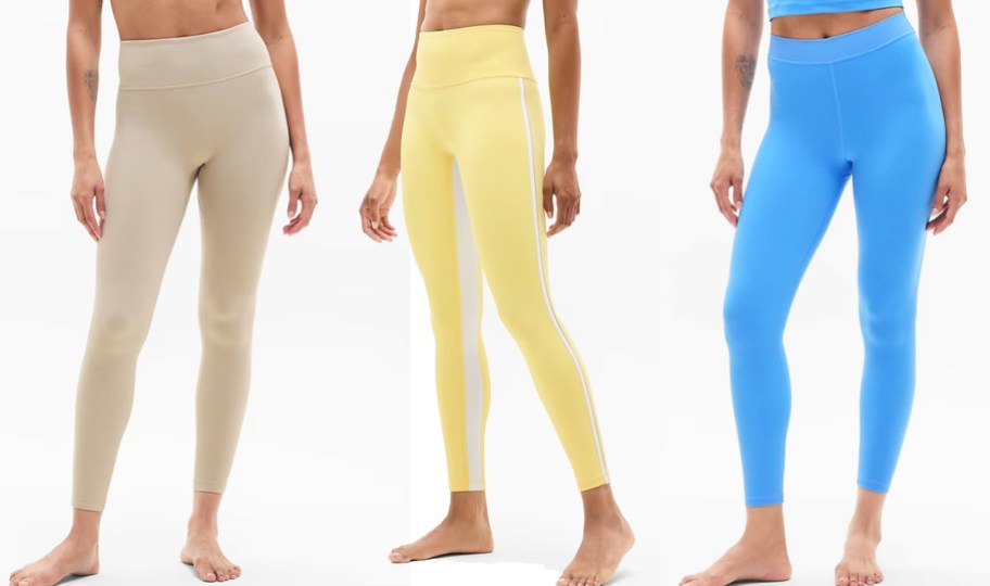 three women in tan, yellow, and blue leggings