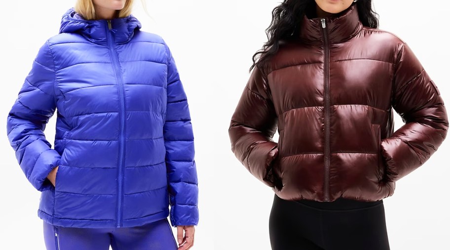 two women in purple and maroon puffer jackets