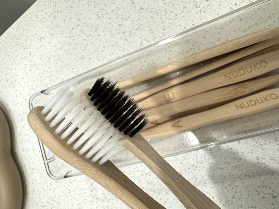 Bamboo toothbrushes on a counter