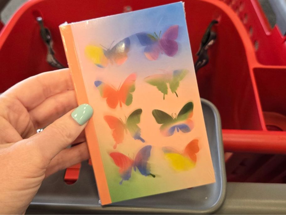 Butterfly Pocket Notebook in hand in store