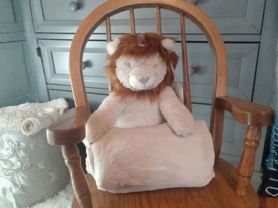 Cloud Island Plush Blanket w/ Soft Lion Toy on chair