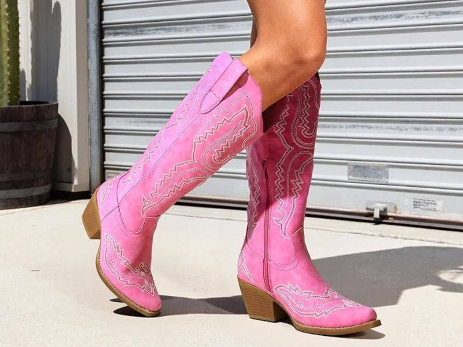woman wearing DREAM PAIRS Cowboy Knee High Boots
