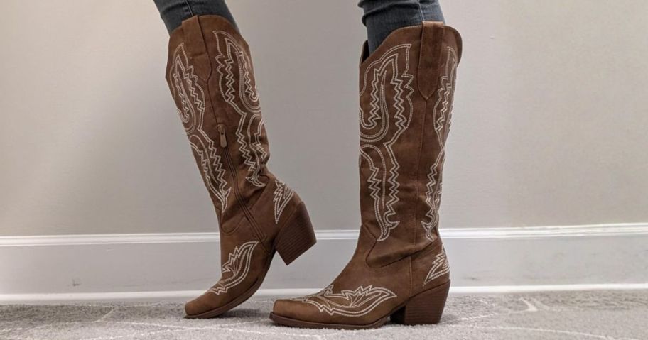 woman wearing DREAM PAIRS Cowboy Knee High Boots