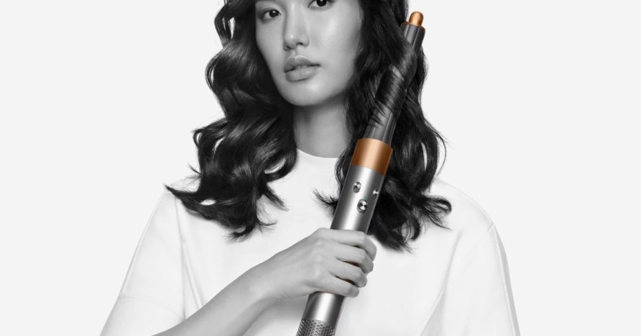 woman using Dyson Airwrap Origin Multi-Styler
