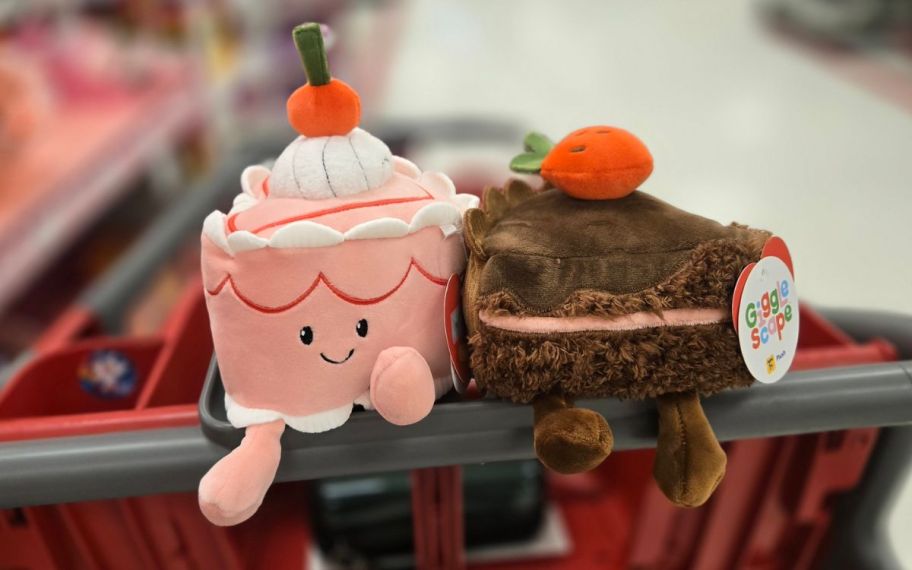 Two different gigglescapes valentines day plushies on top of a Target shopping cart